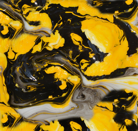 Yellow and black marbling pattern. Modern art. Abstract background.の写真素材