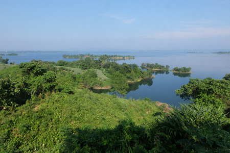 Landscape view of lake and forest with blue sky, kaptai lake,bangladeshの写真素材