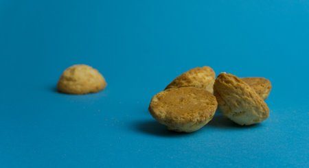 Closeup round butter biscuits. Cookies on a colored background. Dessert, sweetness, lunchの写真素材