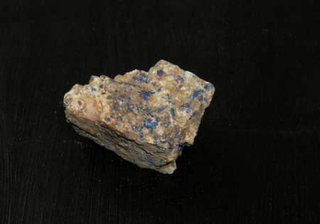 Azurite chessylite from Morocco. Natural mineral stone on a black background. Mineralogy, geology,...