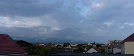SOCHI, RUSSIA - JUNE, 06, 2021: Mountain view near Sochi Adler, outskirts of the city . Cloudy day...