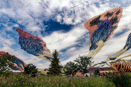 View of kinetic installation on New Holland Island presenting Firebird with colorful materials...