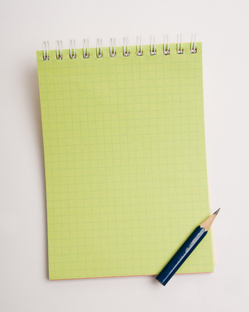 Pencil on the notepad compositionの写真素材