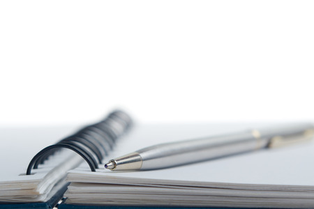 Pen on the notepad compositionの写真素材