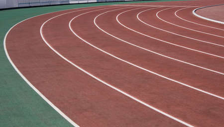 The running ways at the stadium with artificial coating of rubber