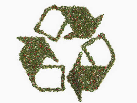 Computer generated illustration of a recycling symbol made up of various flowers and plants. Shadows...