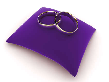 High quality illustration of a pair of wedding rings on a velvet cushion.の写真素材