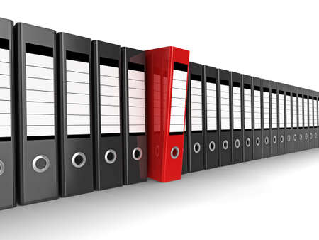 A row of files, with one red one standing out from the othersの写真素材