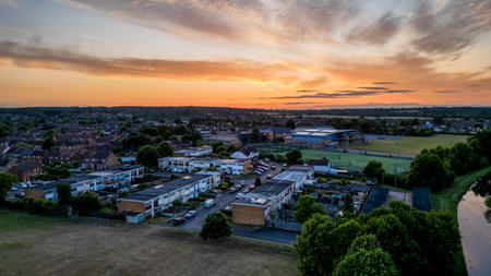 Aerial view of Hoddesdon, Hertfordshire showing river, sunset and housing estate