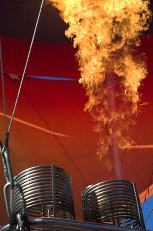 flame from a gas burner inflating a hot air balloonの写真素材