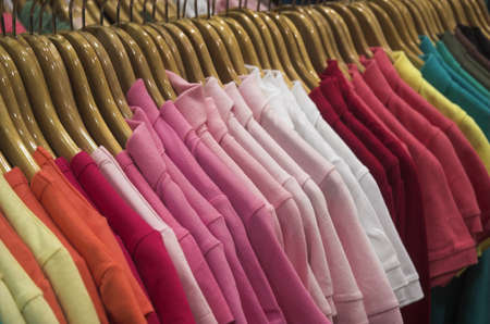 closeup view of clothes in a ladies clothing storeの写真素材