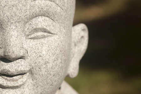 closeup view of a statue of Buddhaの写真素材