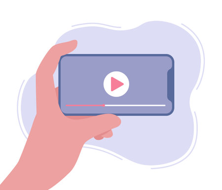 Hand holding phone watching video streaming online on social media. smartphone with video player on screen. Watch movies, educational materials, web courses. Vector illustrationのイラスト素材