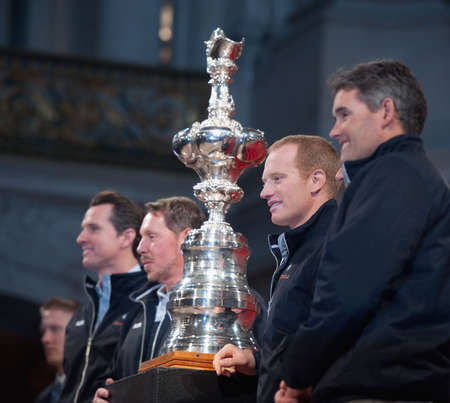 SAN FRANCISCO - FEB 2010: (L to R) SFO Mayor Gavin Newsom, CEO Larry Ellison, James Spithill, Russell Coutts celebrate the return of the America's Cup at City Hall のeditorial素材
