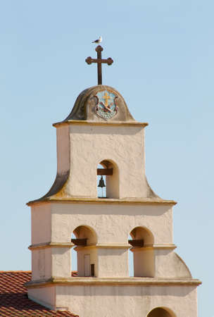 traditional mission bells with cross and seagull in santa barbaraの写真素材