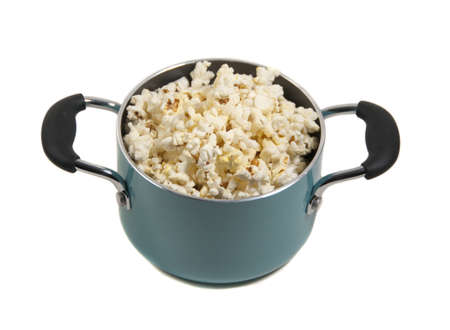 freshly popped corn in turquoise potの写真素材