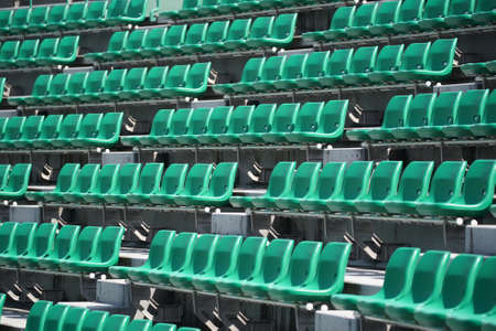 Empty stadium seating stand with no spectatorsの写真素材