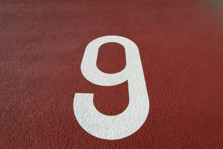 Lane numbers written on the track of the trackの写真素材