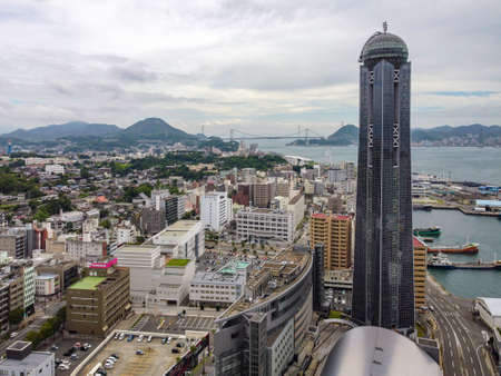 The Kaikyo Yume Tower in Shimonoseki, Yamaguchi Prefecture and the Kanmon Bridge over the Kanmon Straits seen from a bird's eye view.のeditorial素材