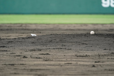 The mound during an offensive and defensive change during a baseball game.