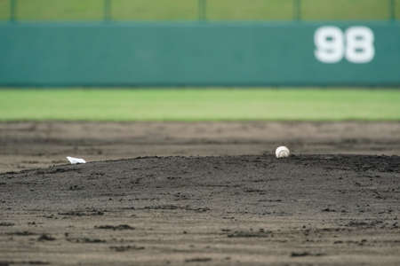 The mound during an offensive and defensive change during a baseball game.の写真素材