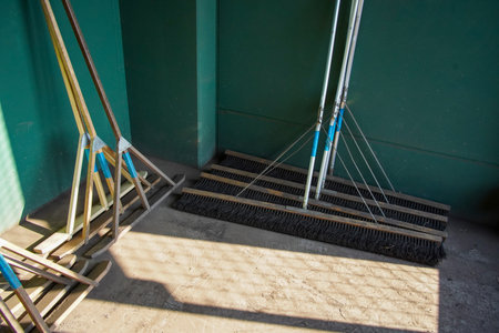 ground rakes and coat brushes used for baseball ground maintenanceの写真素材