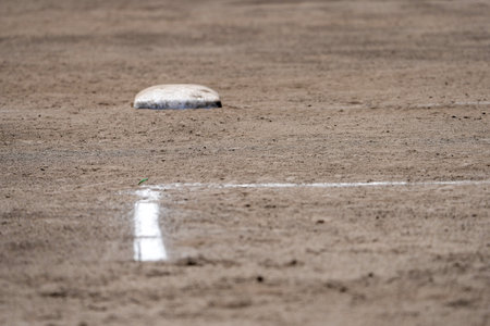 Baseball field with white line on the ground, soft focus.の写真素材