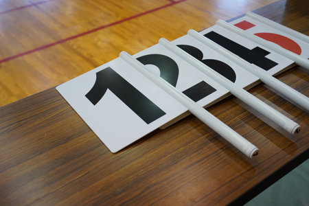 Individual foul indicator board placed on the official's table prior to a basketball game at the court setup.の写真素材