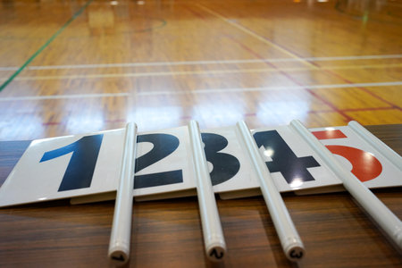 Individual foul indicator board placed on the official's table prior to a basketball game at the court setup.の写真素材