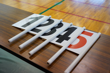Individual foul indicator board placed on the official's table prior to a basketball game at the court setup.の写真素材