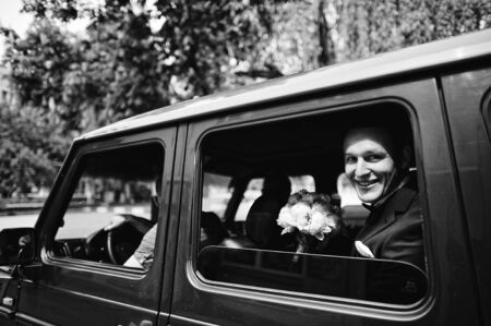 groom at the carの写真素材