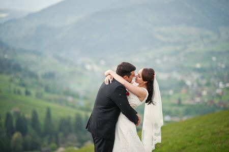 wedding couple in the Carpathian Mountainsの写真素材