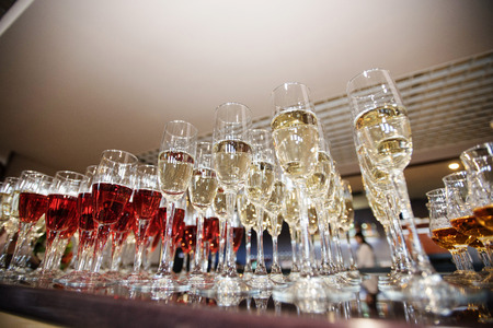 wine, champagne, cognac glasses on wedding receptionの写真素材