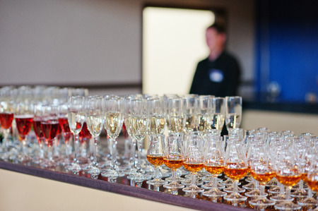 wine, champagne, cognac glasses on wedding receptionの写真素材