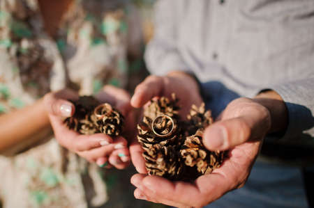 Hands with rings in conesの写真素材
