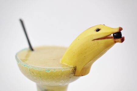 margarita cocktail banane isolated on a white backgroundの写真素材