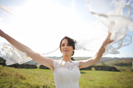 Bride play on wind with veilの写真素材