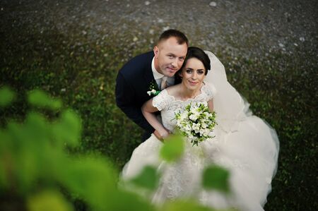 groom embraced wifeの写真素材