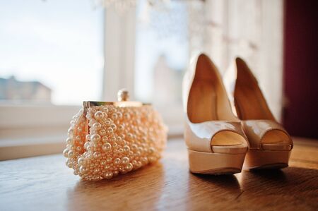 cream bridal shoes and handbagの写真素材