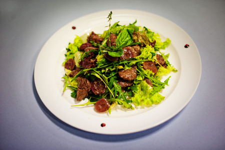 original salade with mushrooms isolated on white backgroundの写真素材
