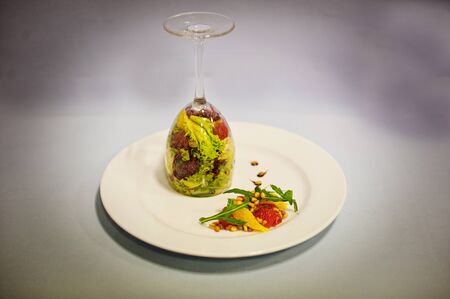original salade on glasses isolated on white backgroundの写真素材
