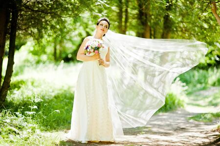 Gorgeus brunette bride outdoors