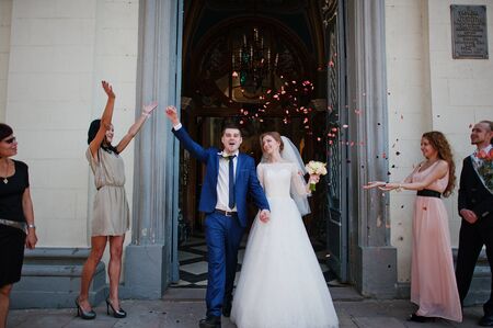 happy wedding couple after church ceremonyの写真素材