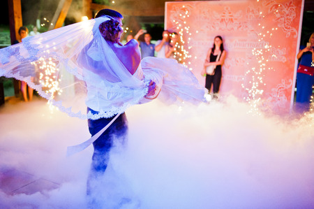 Amazing first wedding dance on heavy smokeの写真素材