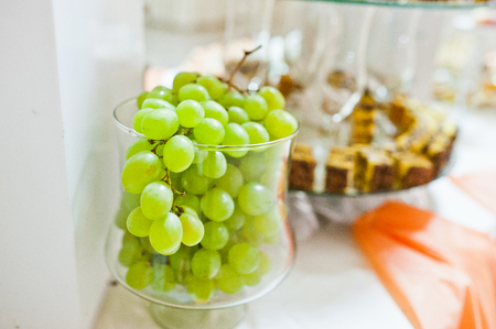 white grapes at glass on wedding receptionの写真素材
