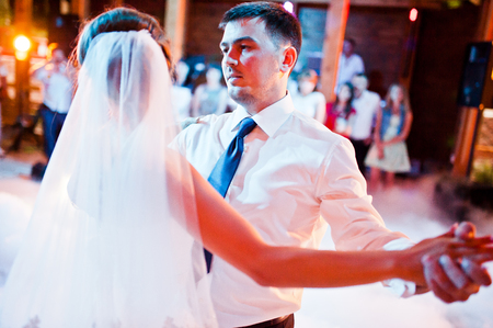 Amazing first wedding dance on heavy smokeの写真素材