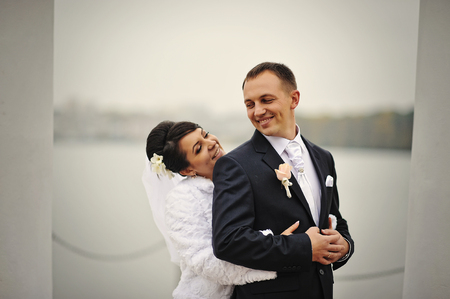 wedding couple background autumn lakeの写真素材