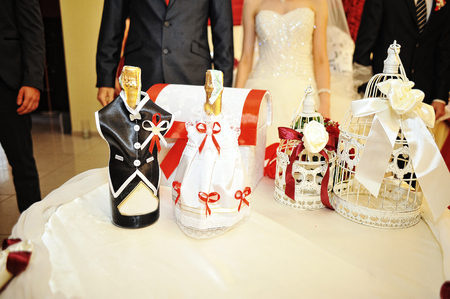 Champagne on funny dress at wedding small tableの写真素材