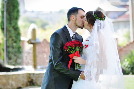 Wedding couple background cross with fountainの写真素材