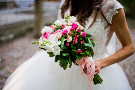 Nice wedding bouquet on hand of bride